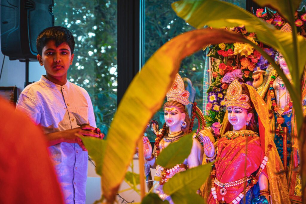 Children taking part in a Ganesh Chaturthi ritual at Dharma Mandir Newport