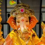 Ganesh murti decorated with flowers during Ganesh Chaturthi celebrations in Newport, Wales